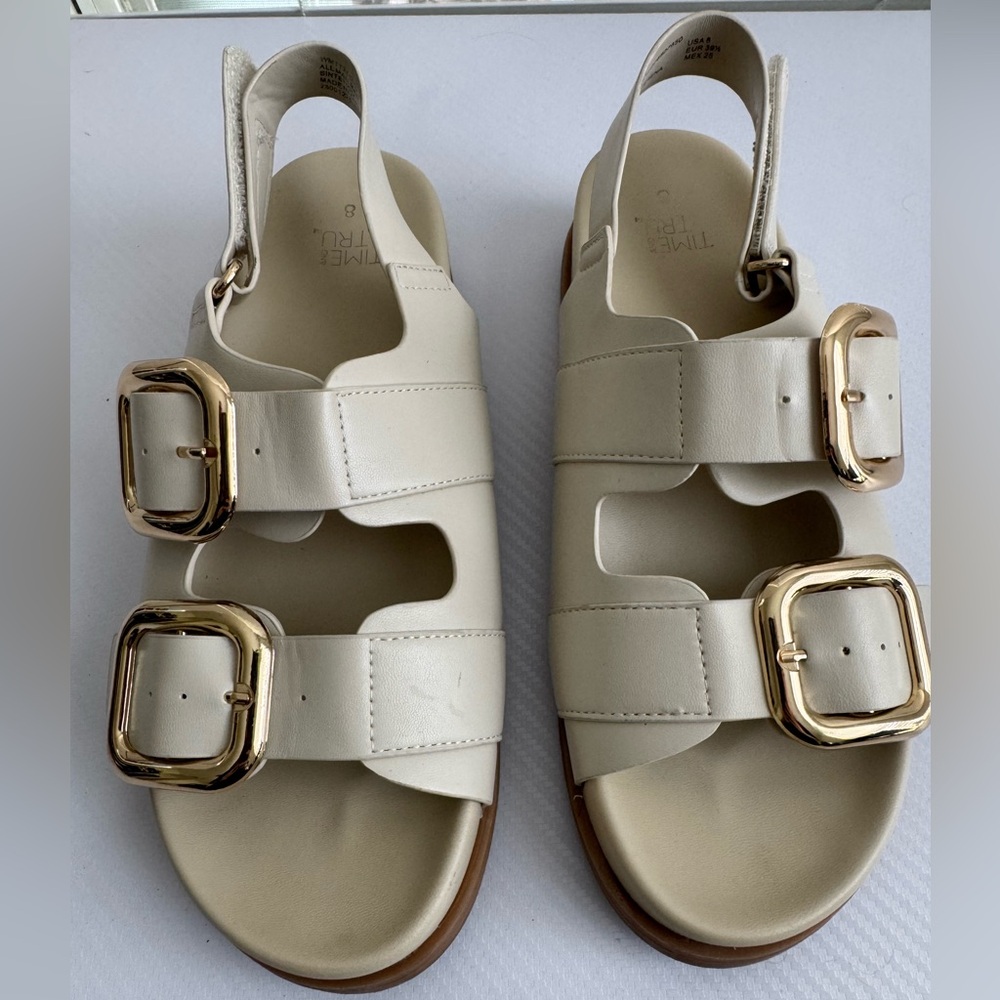 Elegant Cream Sandals with Gold Buckles